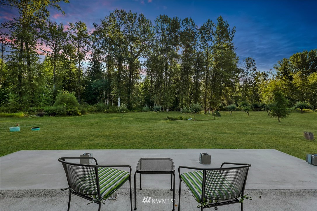 4760 Mission Road Bellingham, WA 98226 - Photo 4 of 40 a view of a two chairs in the park