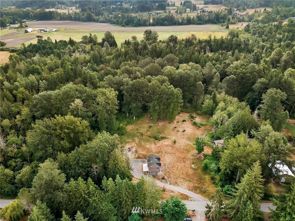 4760 Mission Road Bellingham, WA 98226 - Photo 32 of 40 an aerial view of a houses with yard