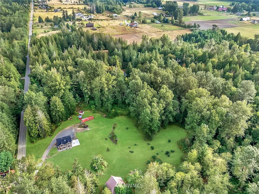 4760 Mission Road Bellingham, WA 98226 - Photo 33 of 40 an aerial view of residential houses with outdoor space and trees