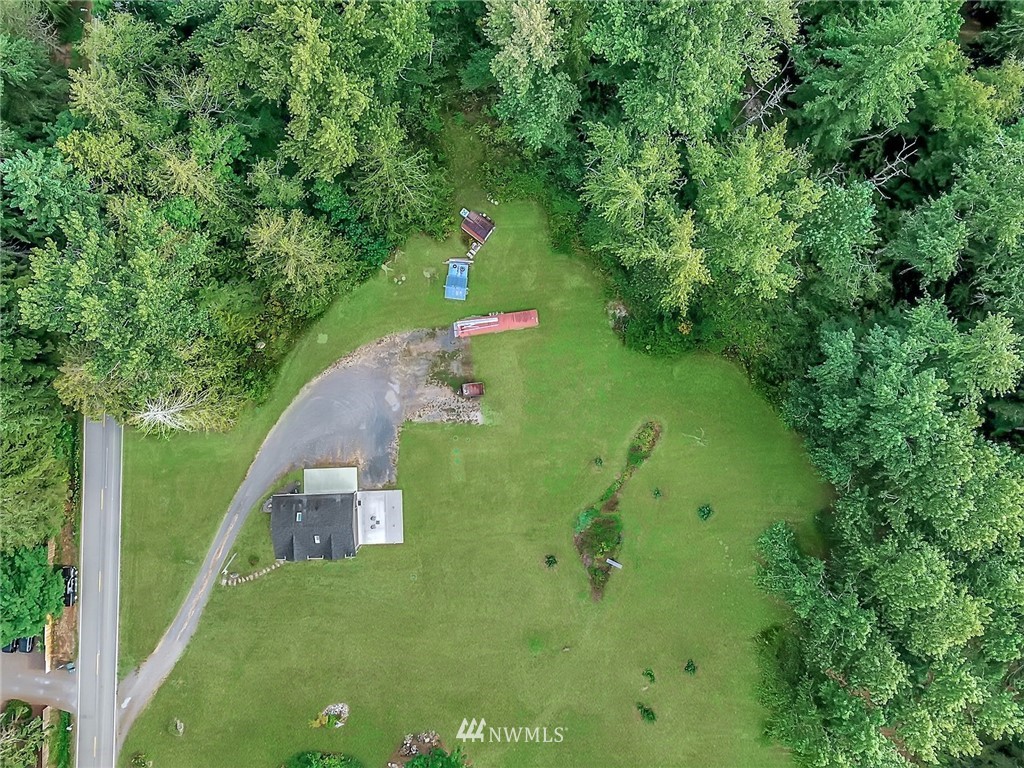 4760 Mission Road Bellingham, WA 98226 - Photo 37 of 40 a view of a house with a yard