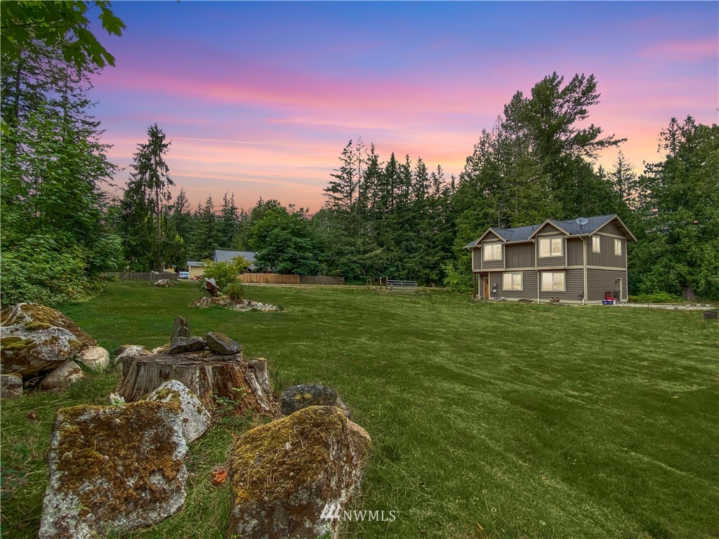 4760 Mission Road Bellingham, WA 98226 - Photo 7 of 40 a front view of a house with garden