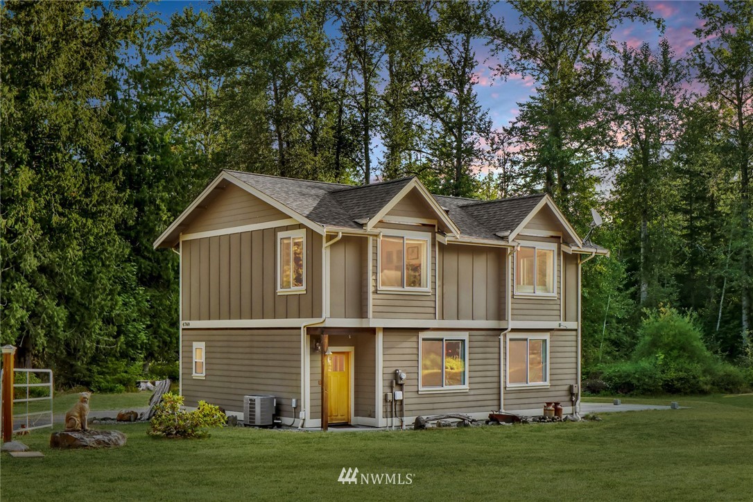 4760 Mission Road Bellingham, WA 98226 - Photo 8 of 40 a view of a house with a yard