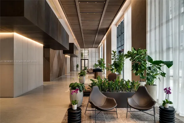 a view of a chairs and table in a patio