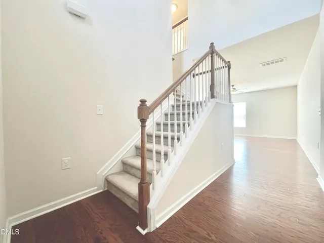 a view of entryway with wooden floor
