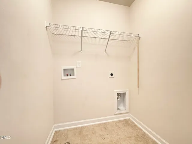 a view of a house with backyard and windows