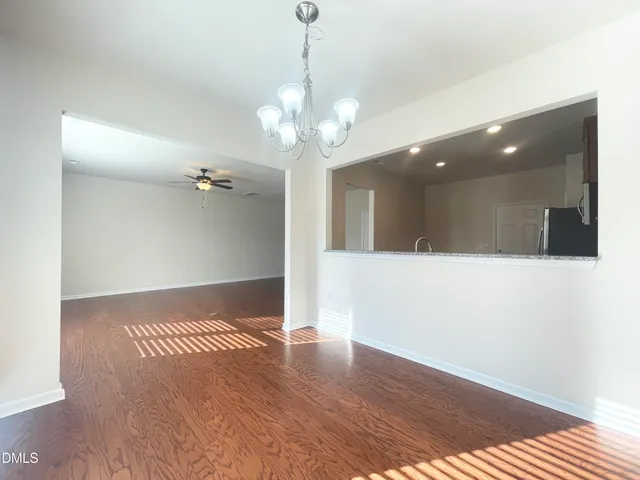 a bathroom with a sink a mirror and a vanity