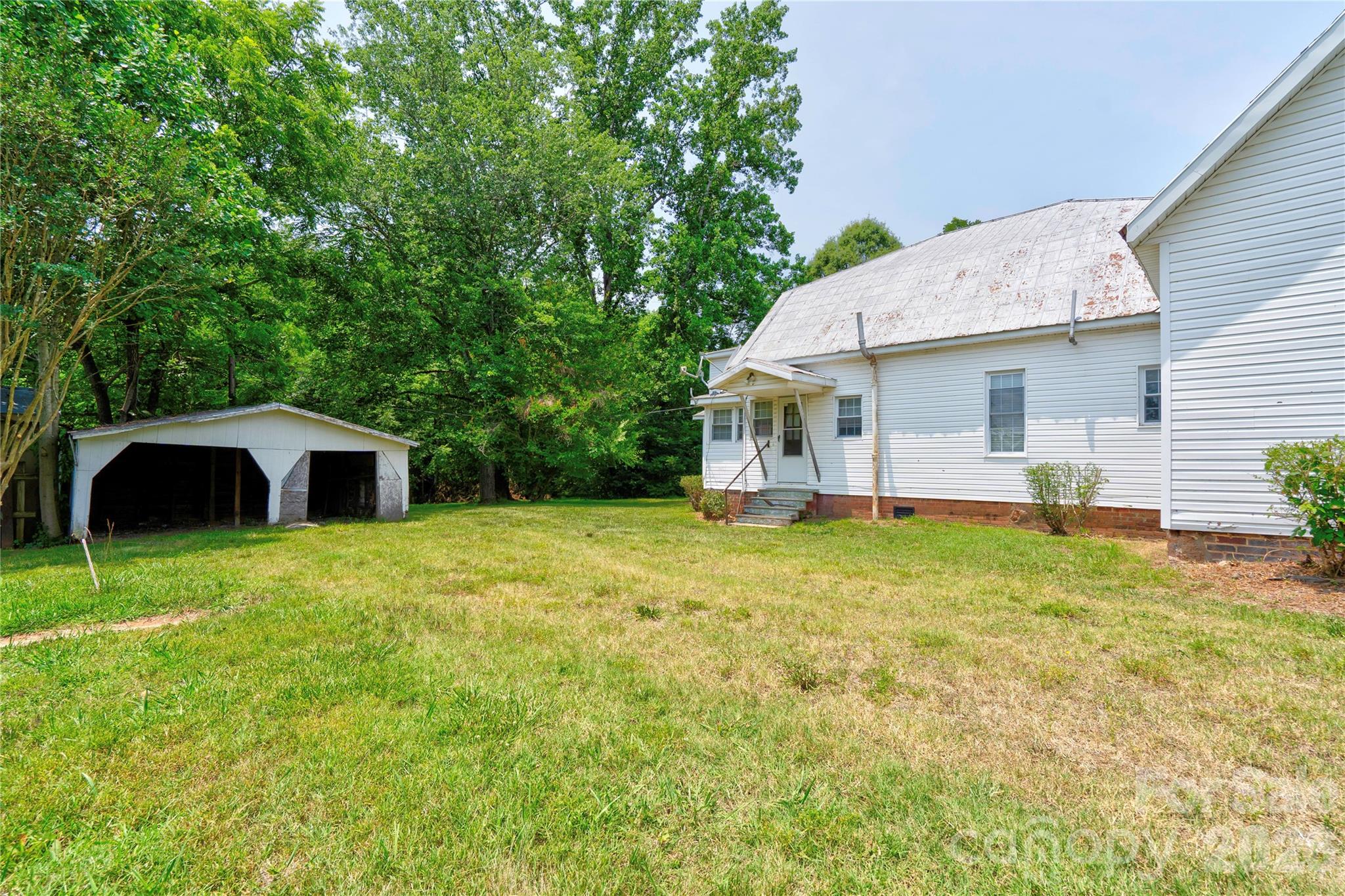 1813 St Marks Church Road Crouse, NC 28033 - Photo 7 of 22 a view of a house with backyard and garden