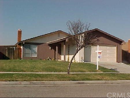 7127 Idyllwild Lane Riverside, CA 92503 - Photo 1 of 1 a front view of a house with a yard