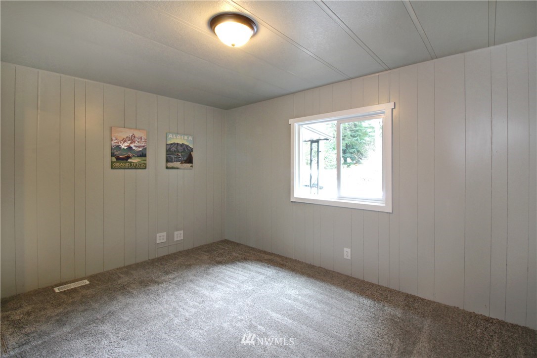 531 Northeast Beck Road Belfair, WA 98528 - Photo 11 of 14 an empty room with a window