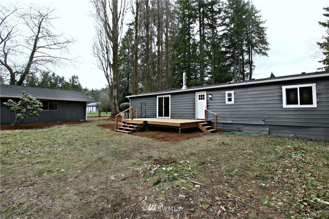 531 Northeast Beck Road Belfair, WA 98528 - Photo 13 of 14 front view of a house with a yard