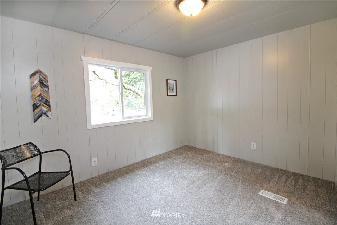 531 Northeast Beck Road Belfair, WA 98528 - Photo 9 of 14 a view of an empty room with a window