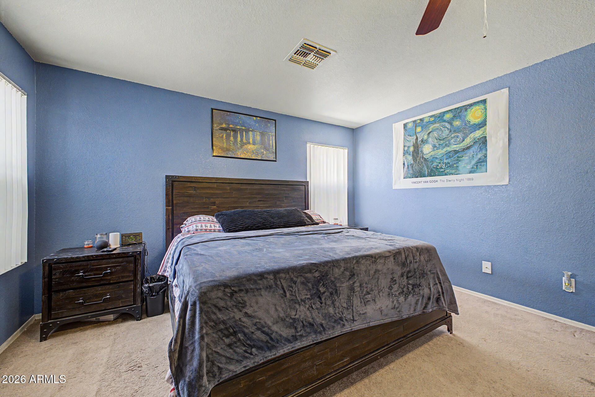 2607 West Bloch Road Phoenix, AZ 85041 - Photo 19 of 34 a bedroom with a bed and a tv