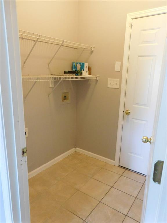 566 Pond Lillies Road Southeast Lawrenceville, GA 30045 - Photo 16 of 45 a view of a room with racks on the wall