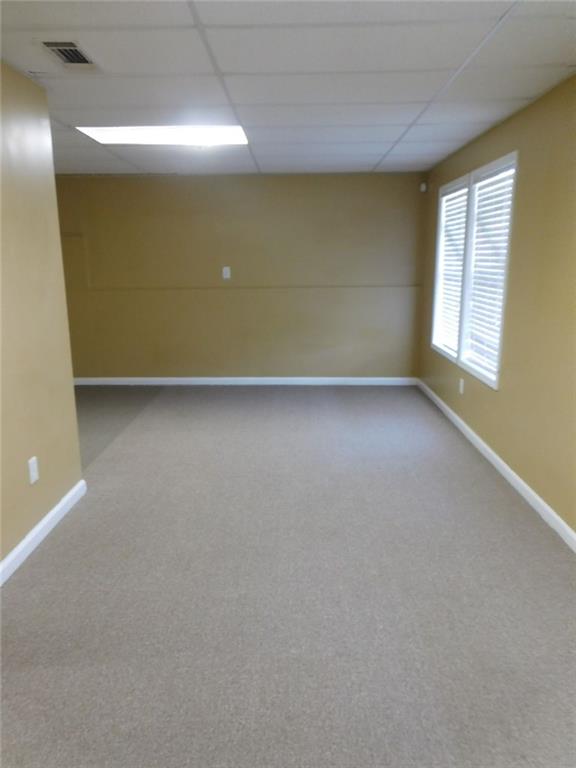 566 Pond Lillies Road Southeast Lawrenceville, GA 30045 - Photo 33 of 45 an empty room with windows