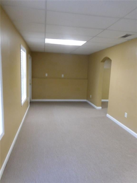 566 Pond Lillies Road Southeast Lawrenceville, GA 30045 - Photo 35 of 45 an empty room with a empty space and windows
