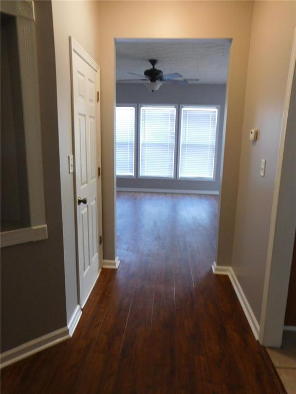 566 Pond Lillies Road Southeast Lawrenceville, GA 30045 - Photo 5 of 45 wooden floor in an empty room