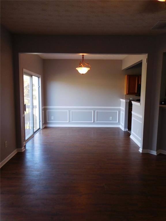 566 Pond Lillies Road Southeast Lawrenceville, GA 30045 - Photo 10 of 45 a view of room and hardwood floor