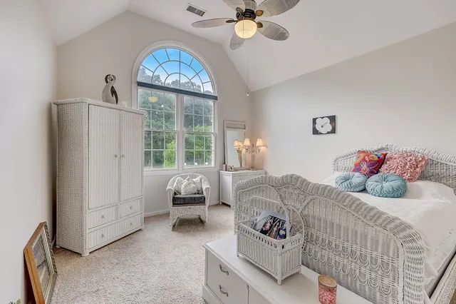 a bathroom with a granite countertop sink toilet tub and shower