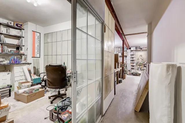 a living room with furniture and garden view
