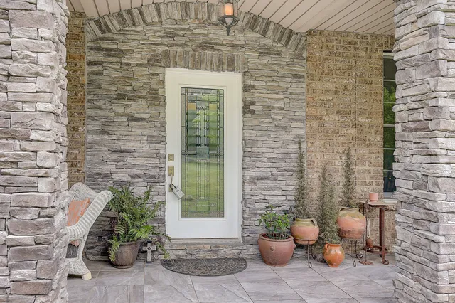 a front view of a house with outdoor space