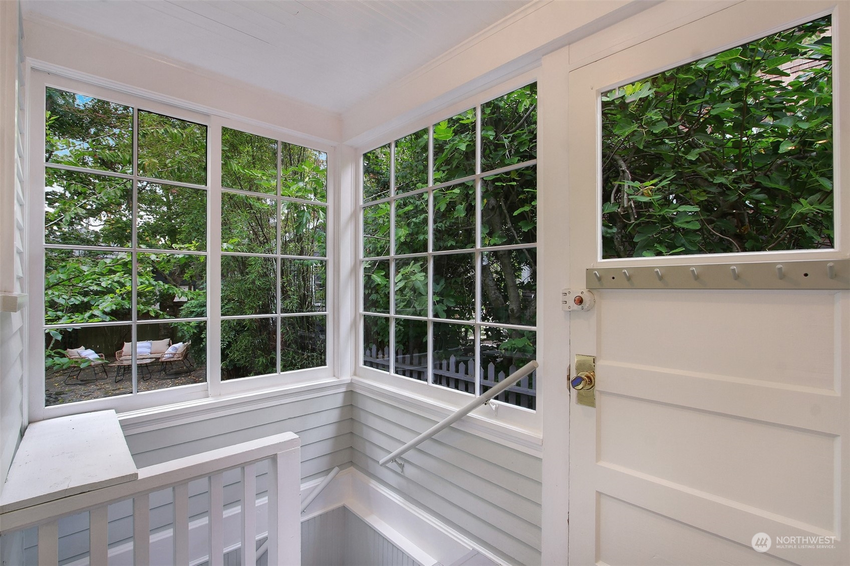 4019 Sunnyside Avenue North Seattle, WA 98103 - Photo 12 of 22 a view of balcony with floor to ceiling windows and wooden floor