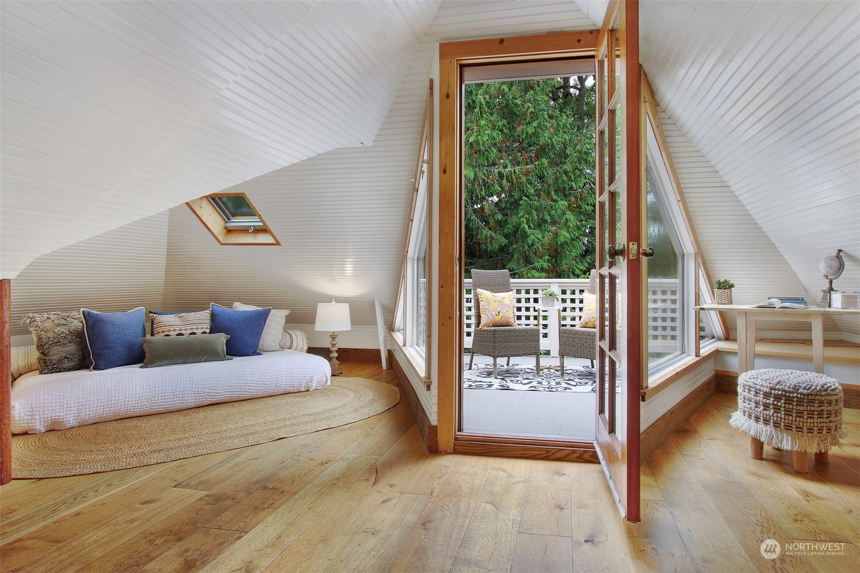 4019 Sunnyside Avenue North Seattle, WA 98103 - Photo 14 of 22 a living room with furniture and a gate