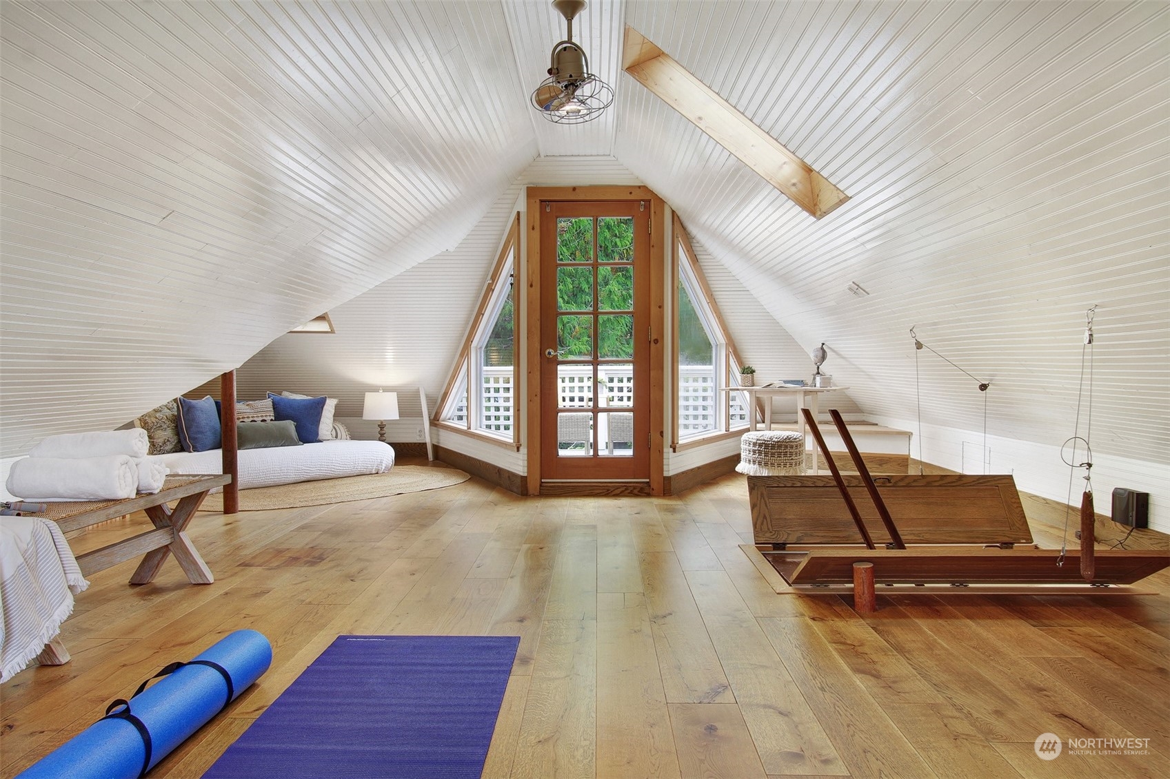 4019 Sunnyside Avenue North Seattle, WA 98103 - Photo 16 of 22 a living room with a couch and wooden floor