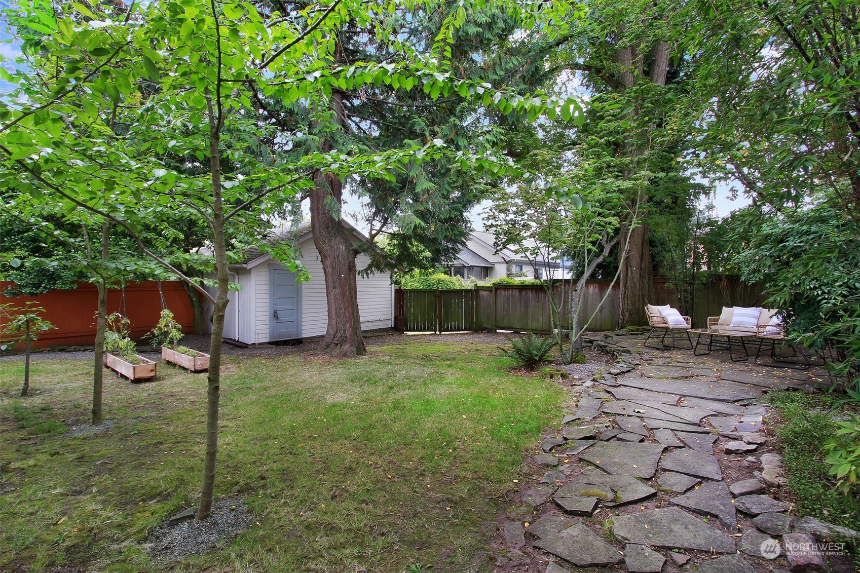 4019 Sunnyside Avenue North Seattle, WA 98103 - Photo 19 of 22 a backyard of a house with seating space