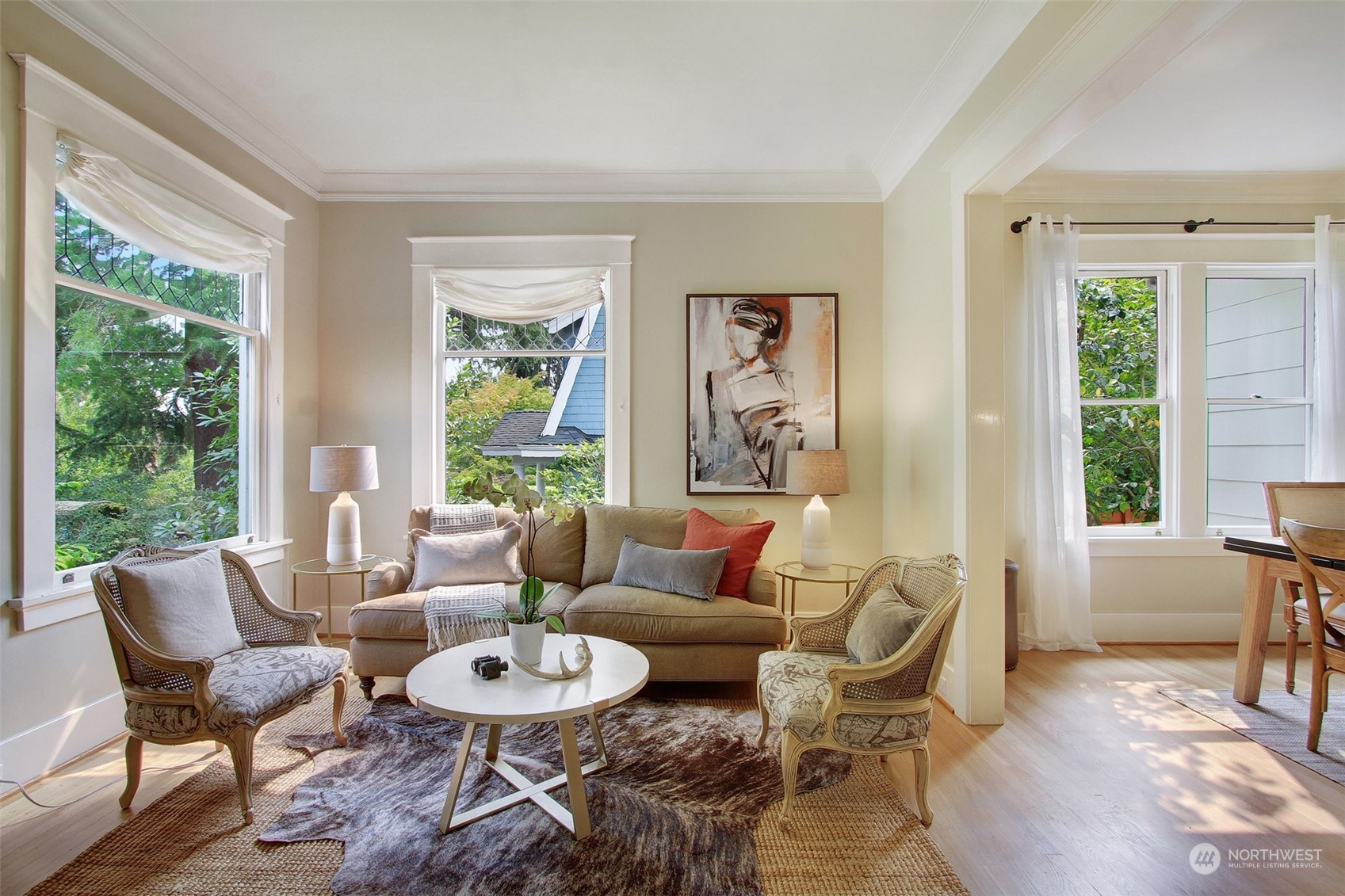 4019 Sunnyside Avenue North Seattle, WA 98103 - Photo 2 of 22 a living room with furniture and a large window