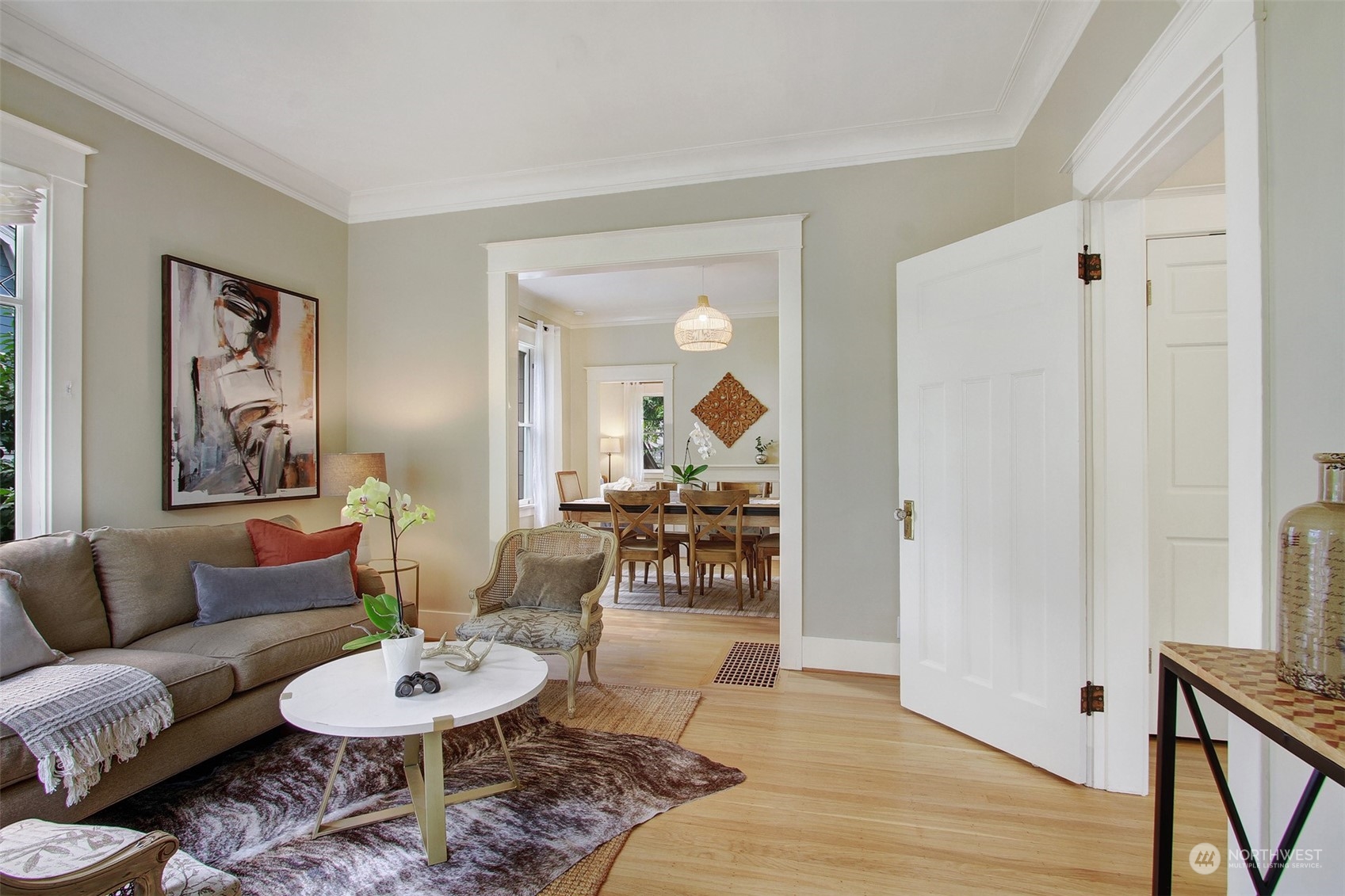4019 Sunnyside Avenue North Seattle, WA 98103 - Photo 3 of 22 a living room with furniture and a wooden floor