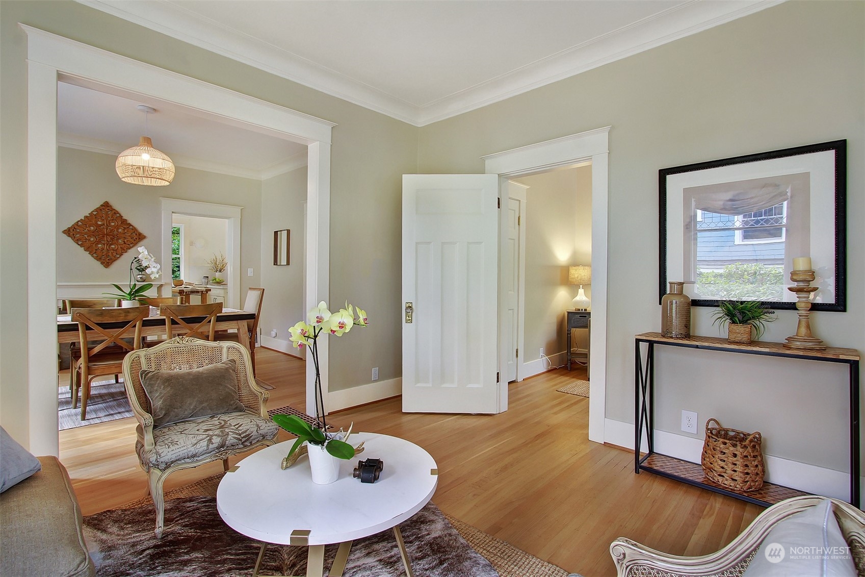 4019 Sunnyside Avenue North Seattle, WA 98103 - Photo 5 of 22 a living room with furniture and a potted plant