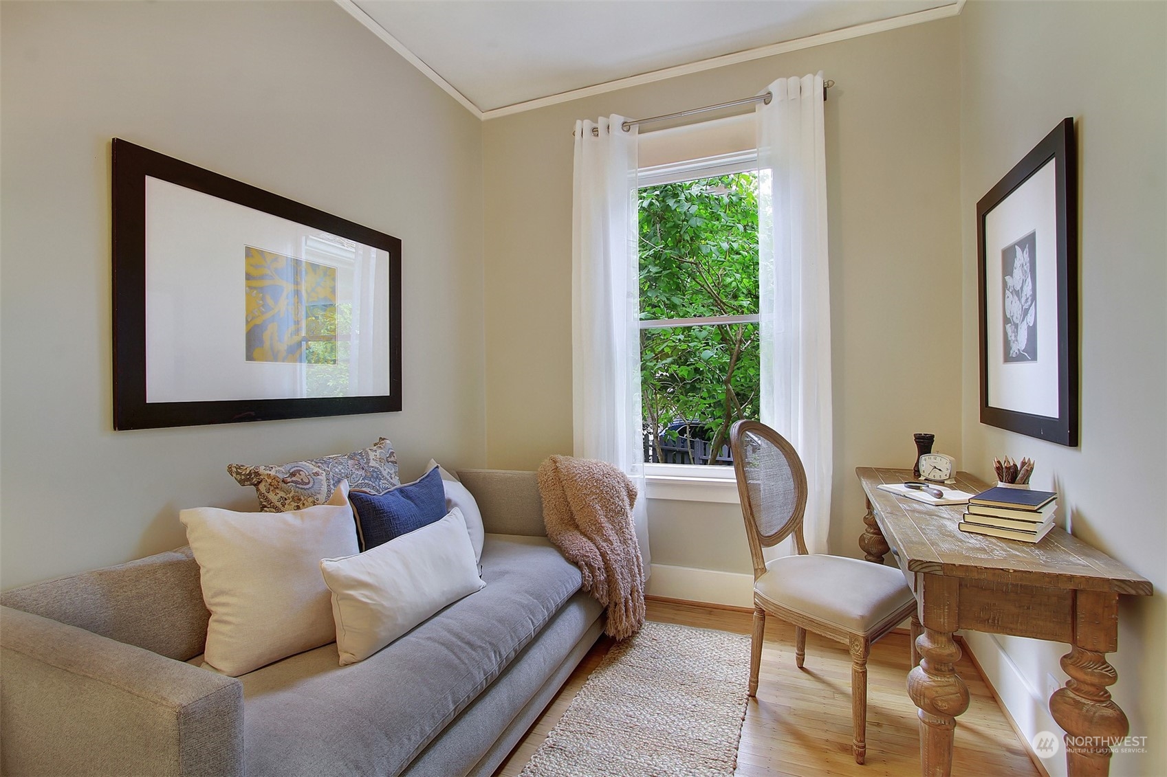 4019 Sunnyside Avenue North Seattle, WA 98103 - Photo 6 of 22 a living room with furniture and a window