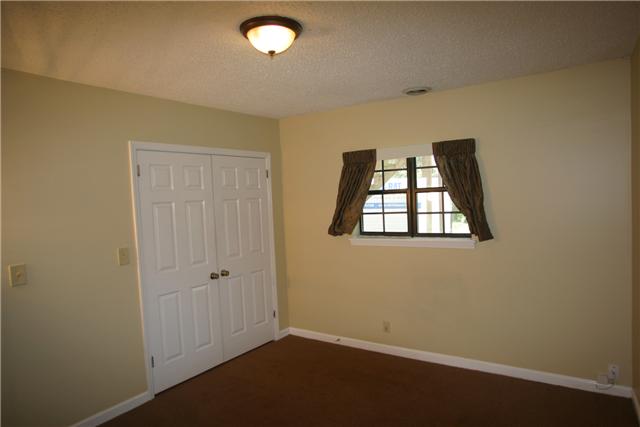 7309 Cavalier Road Nashville, TN 37221 - Photo 15 of 20 Lower Level 2nd & 3rd bedrooms. Walk in Closet.