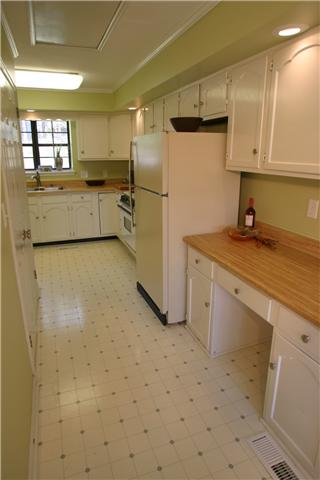7309 Cavalier Road Nashville, TN 37221 - Photo 4 of 20 Built In Kitchen Work Station with Adjacent Laundry
