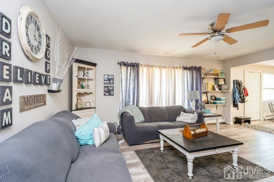 121 Winthrop Road Edison, NJ 08817 - Photo 13 of 16 a living room with furniture and a large window