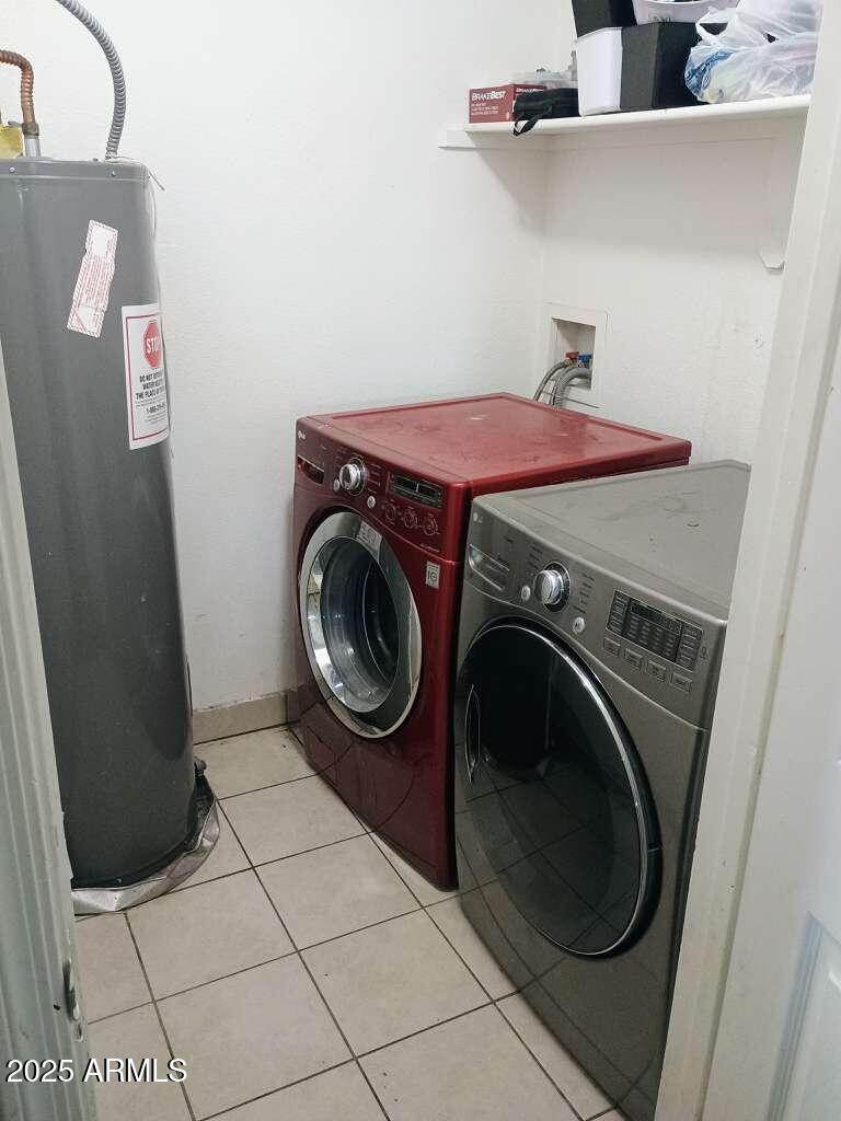 1748 West Sherman Street Phoenix, AZ 85007 - Photo 12 of 15 a utility room with dryer and washer