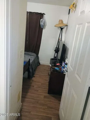 a view of a closet with storage