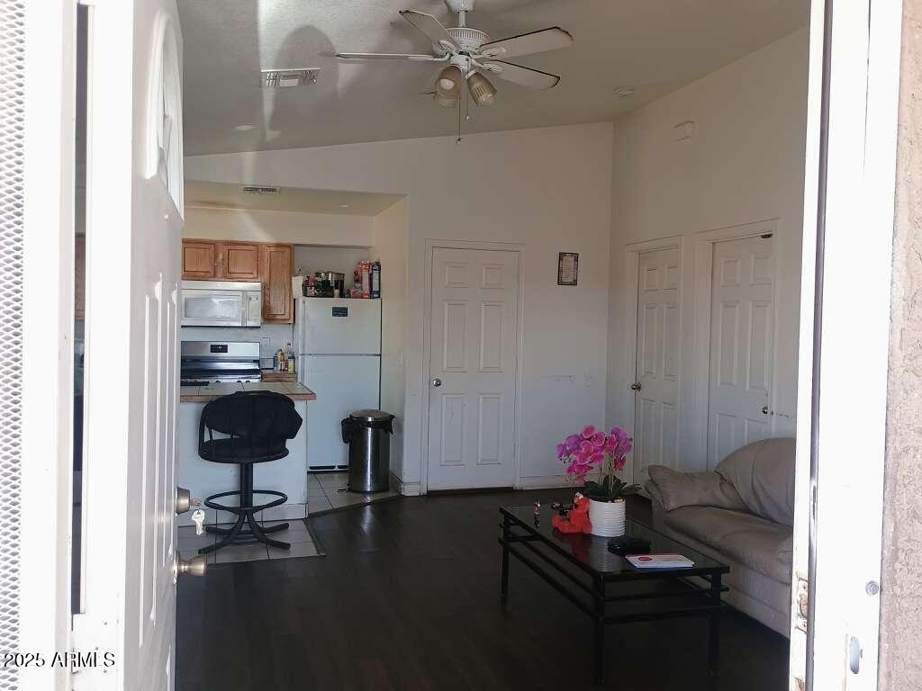 1748 West Sherman Street Phoenix, AZ 85007 - Photo 5 of 15 a living room with furniture