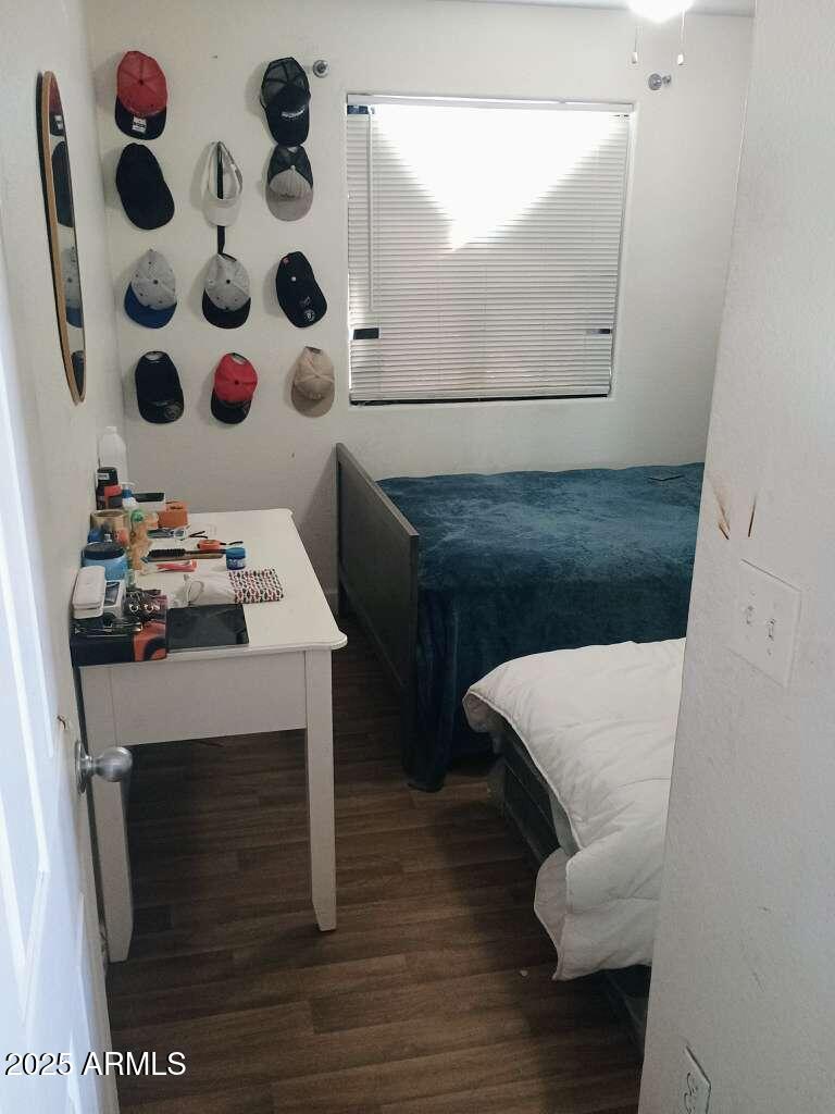 1748 West Sherman Street Phoenix, AZ 85007 - Photo 7 of 15 a living room with furniture and a fireplace