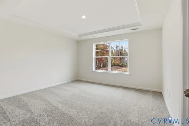 an empty room with a bathroom