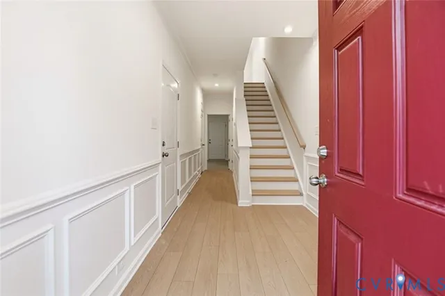 a view of a hallway with staircase