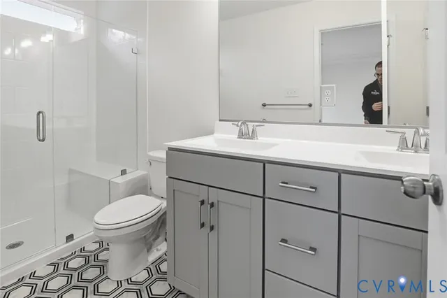 a bathroom with a shower and a toilet