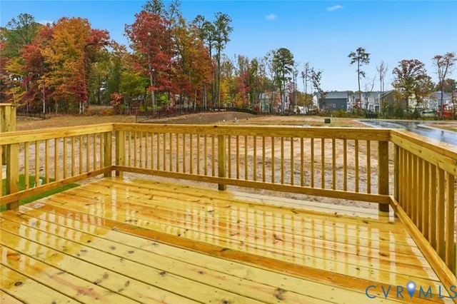 aerial view of a house with a yard