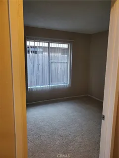 a view of a livingroom with a staircase