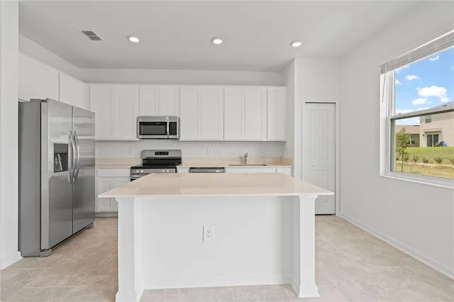 a front view of house with yard and seating