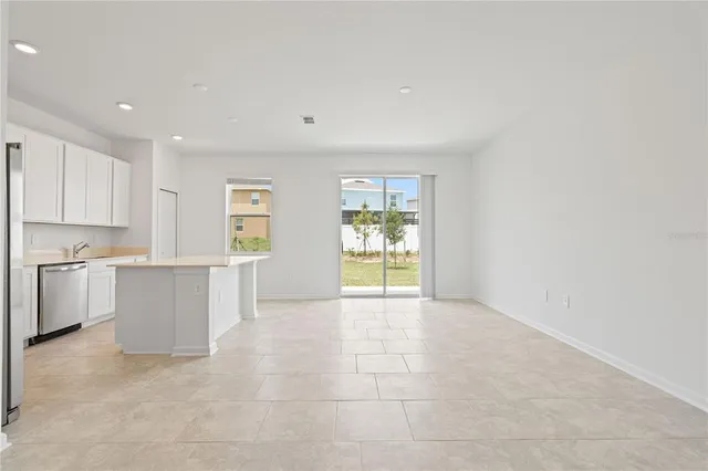 a view of an empty room and window