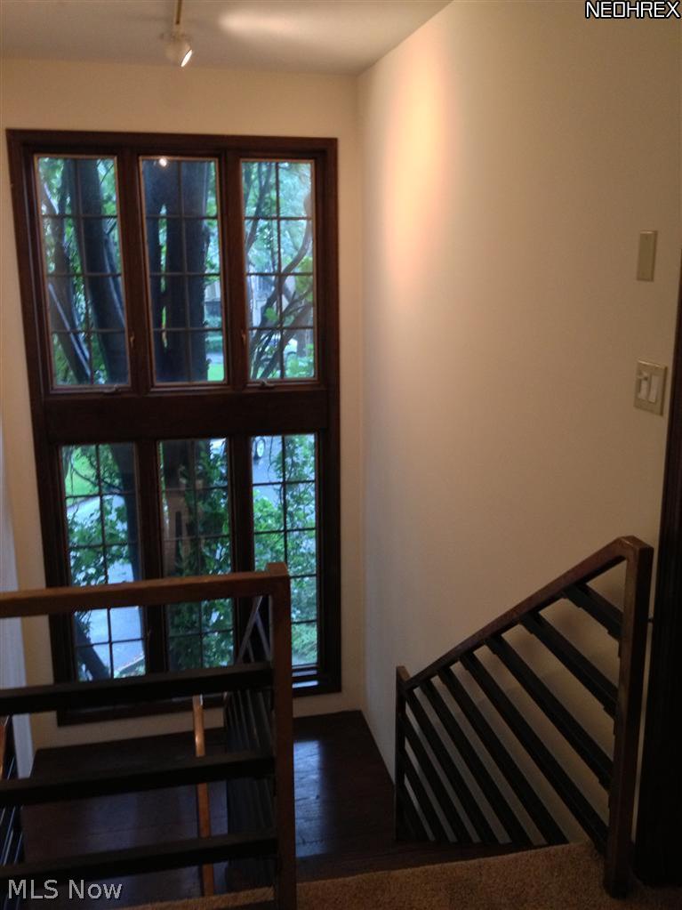 12501 Fairhill Road Cleveland, OH 44120 - Photo 20 of 25 Even the stairwells are architecturally intriguing and add to the open feel of the home.