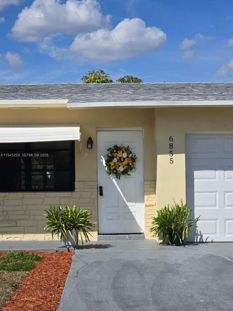 6855 Northwest 9th Street Margate, FL 33063 - Photo 1 of 21 a view of a terrace with hardwood