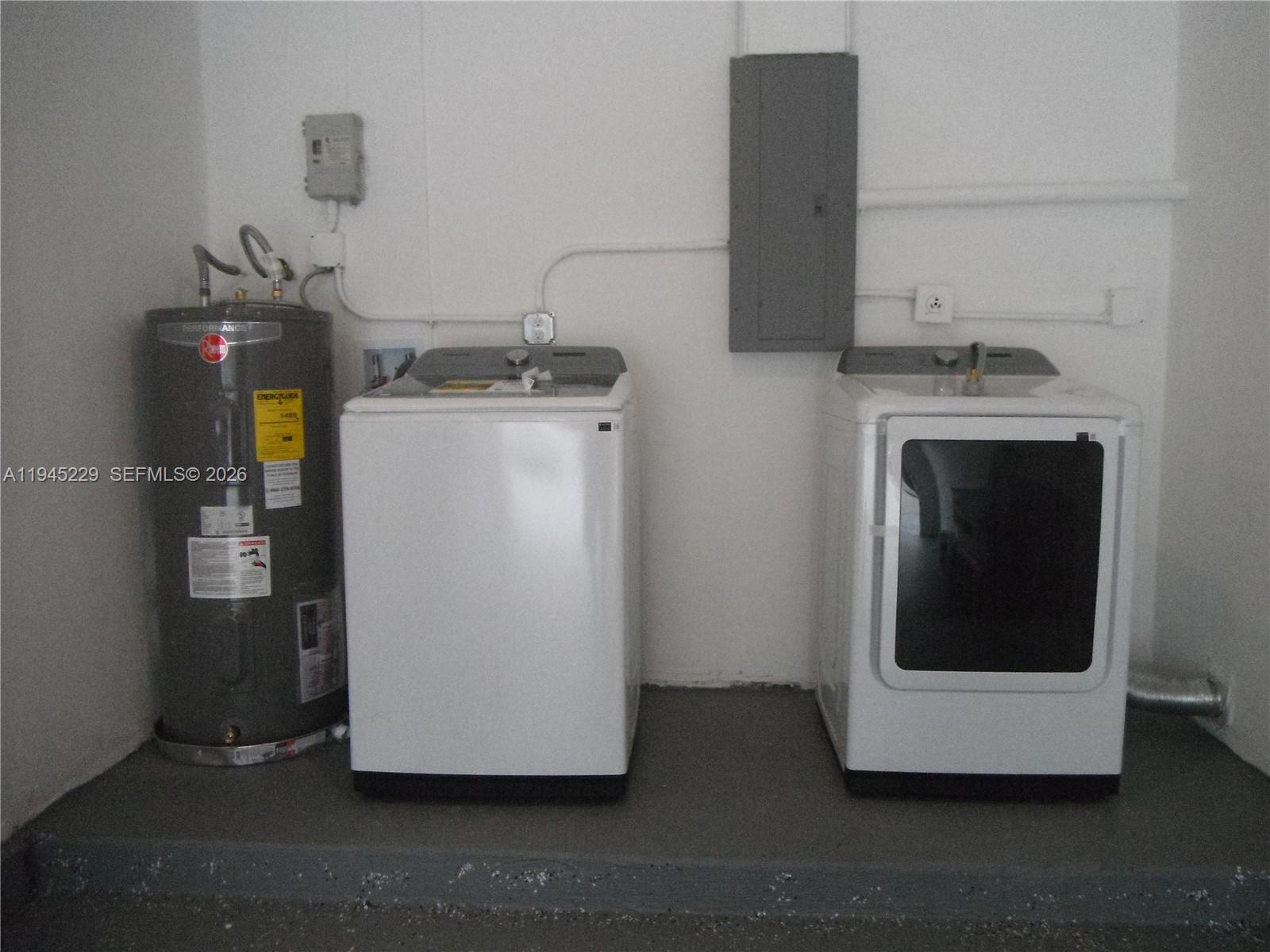 6855 Northwest 9th Street Margate, FL 33063 - Photo 14 of 21 a utility room with a washer and dryer