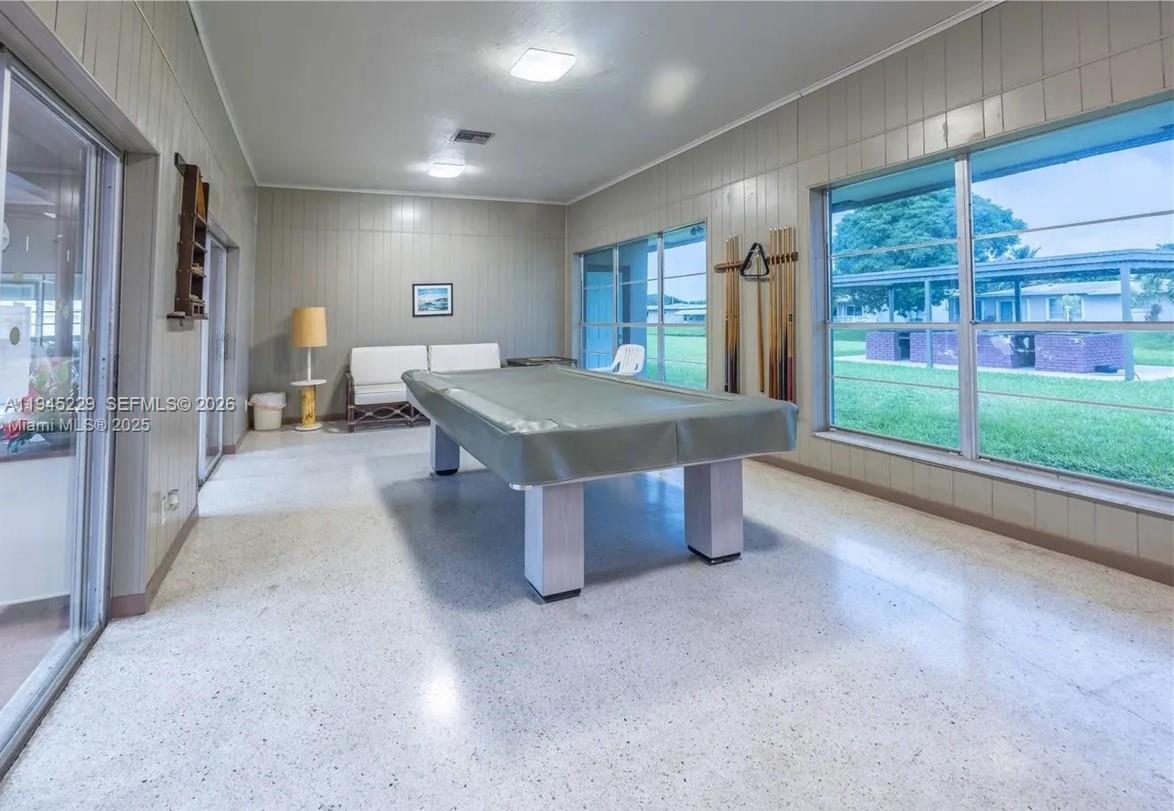 6855 Northwest 9th Street Margate, FL 33063 - Photo 18 of 21 a room with pool table and windows